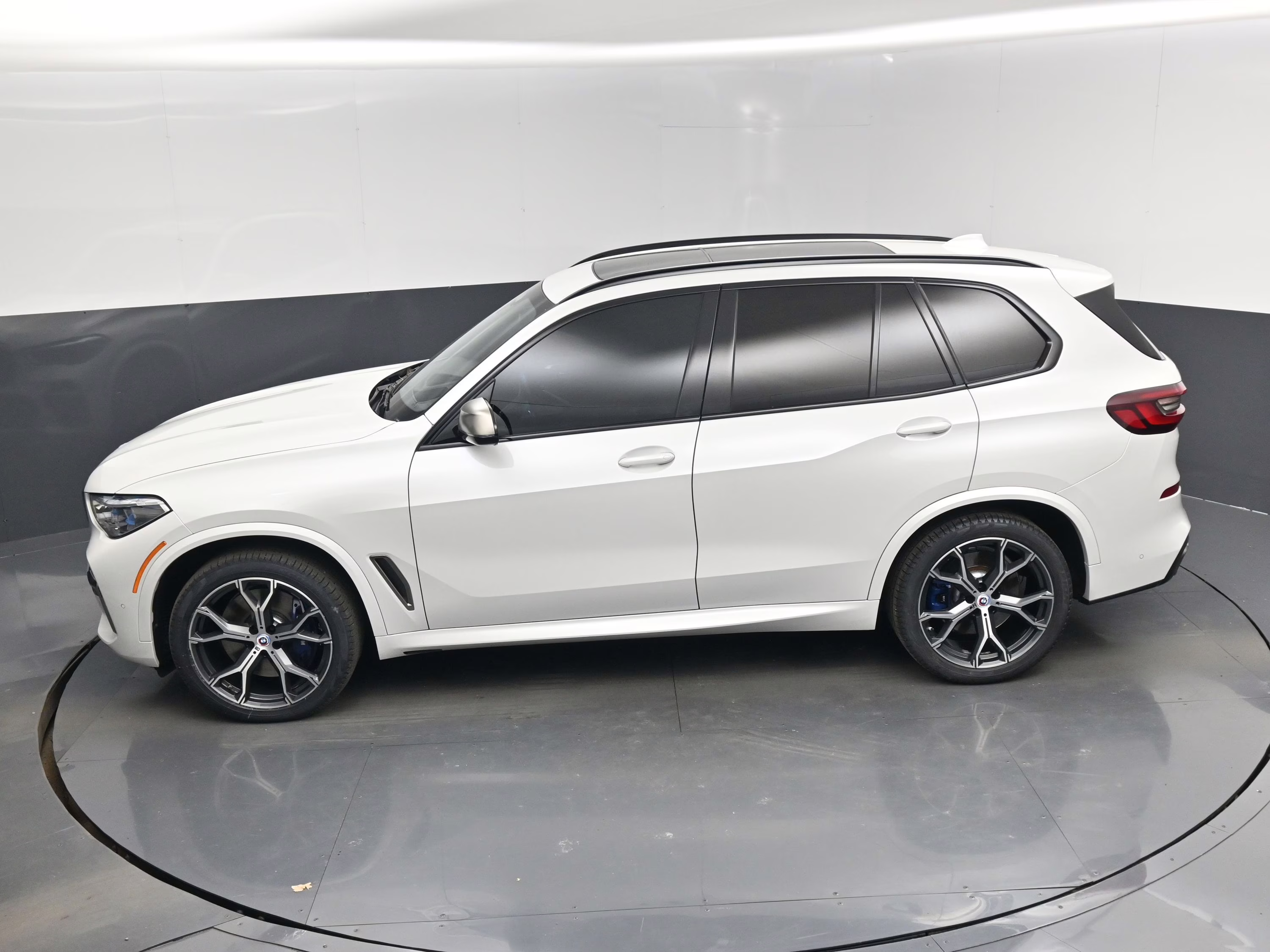 2023 Mineral White Metallic BMW X5 M50i AWD SUV