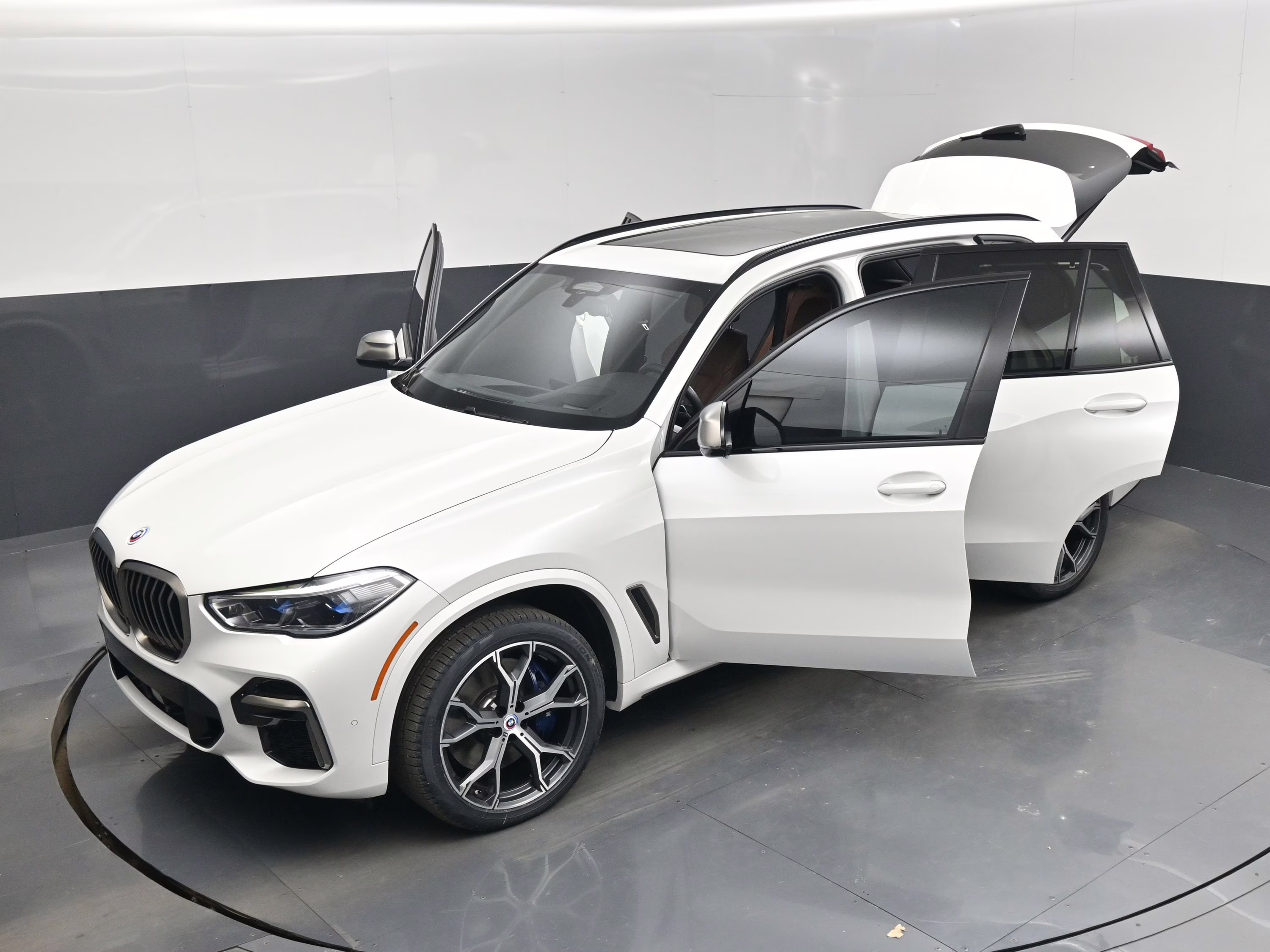 2023 Mineral White Metallic BMW X5 M50i AWD SUV
