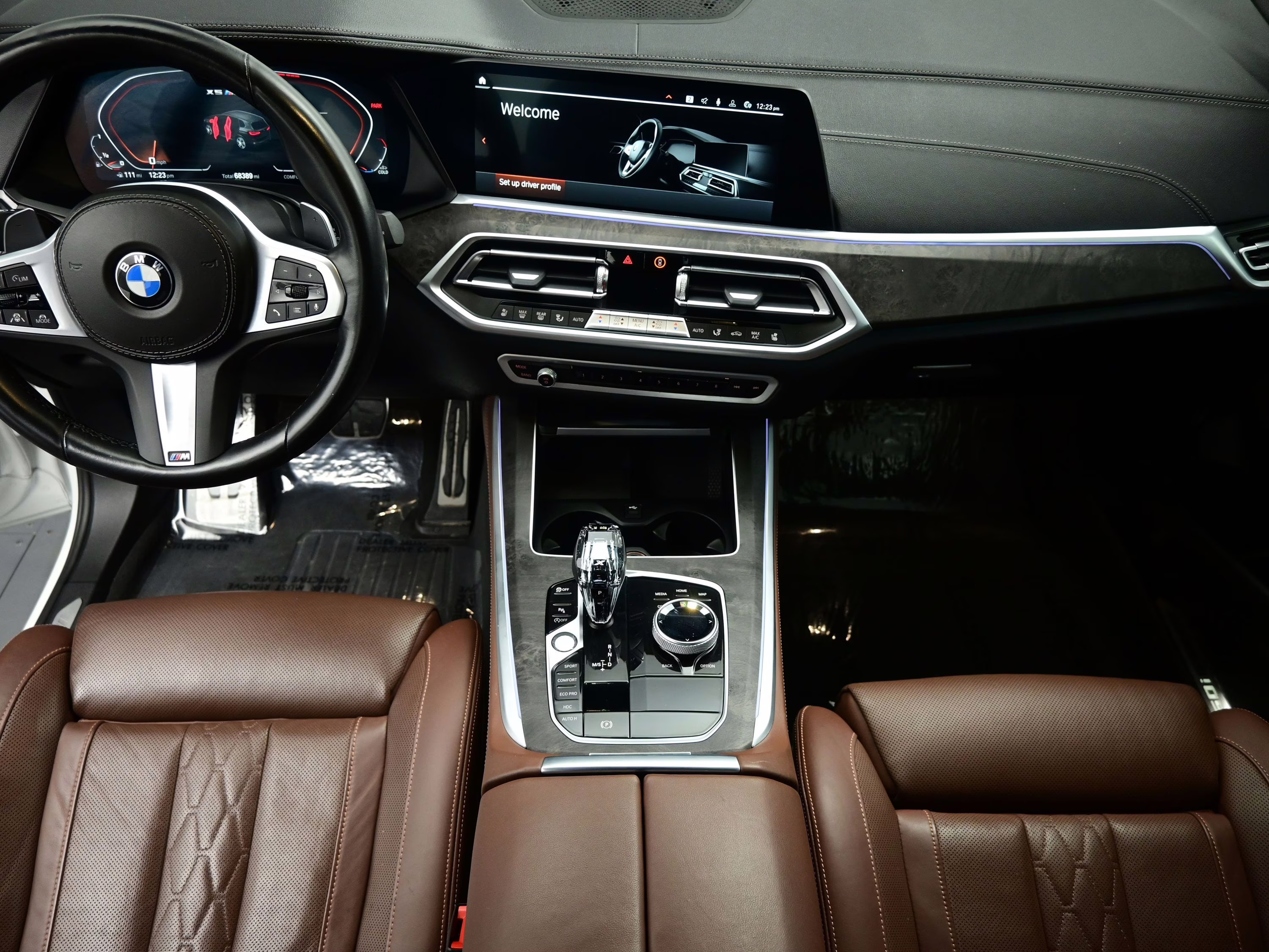 2023 Mineral White Metallic BMW X5 M50i AWD SUV