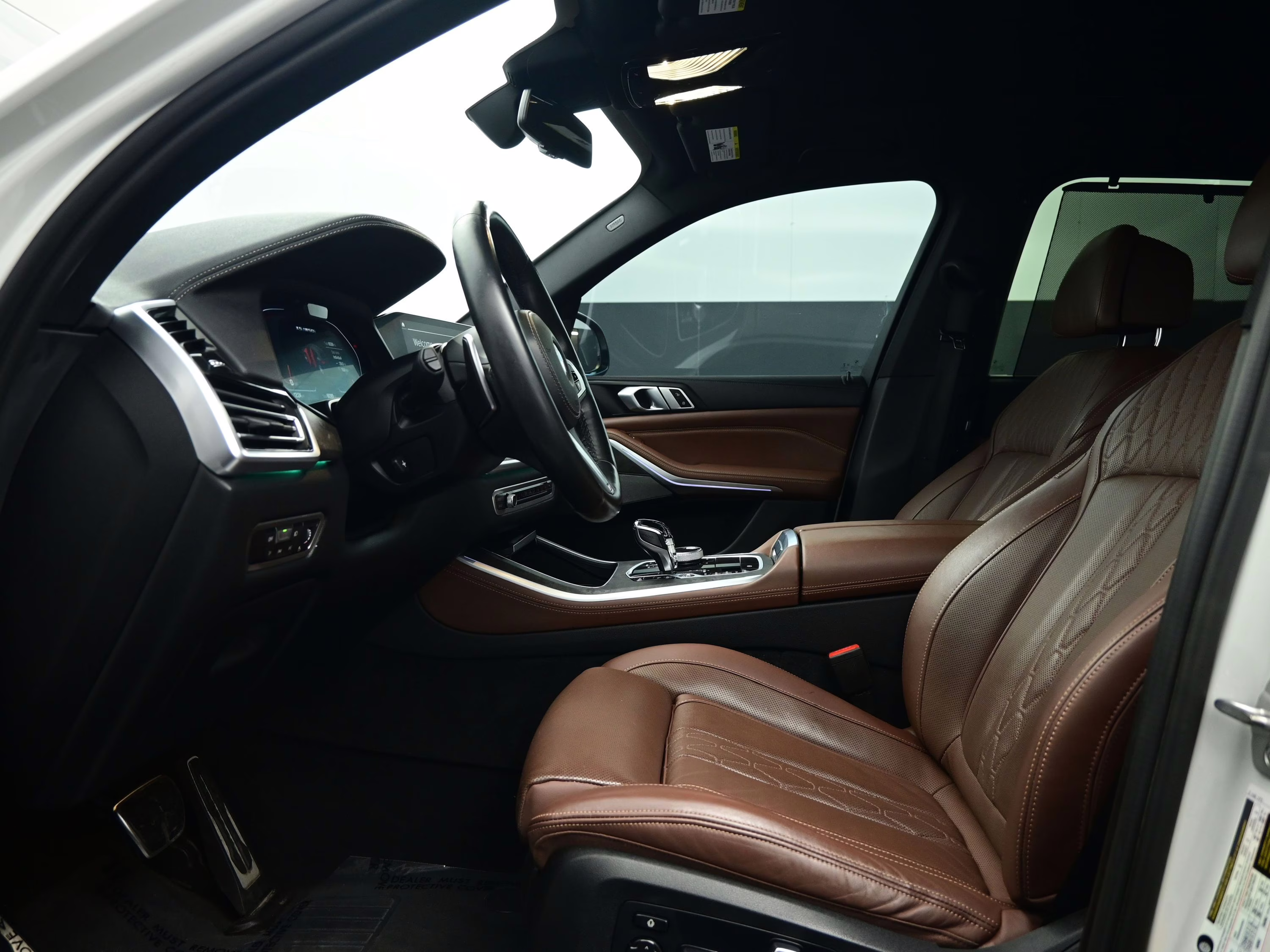 2023 Mineral White Metallic BMW X5 M50i AWD SUV