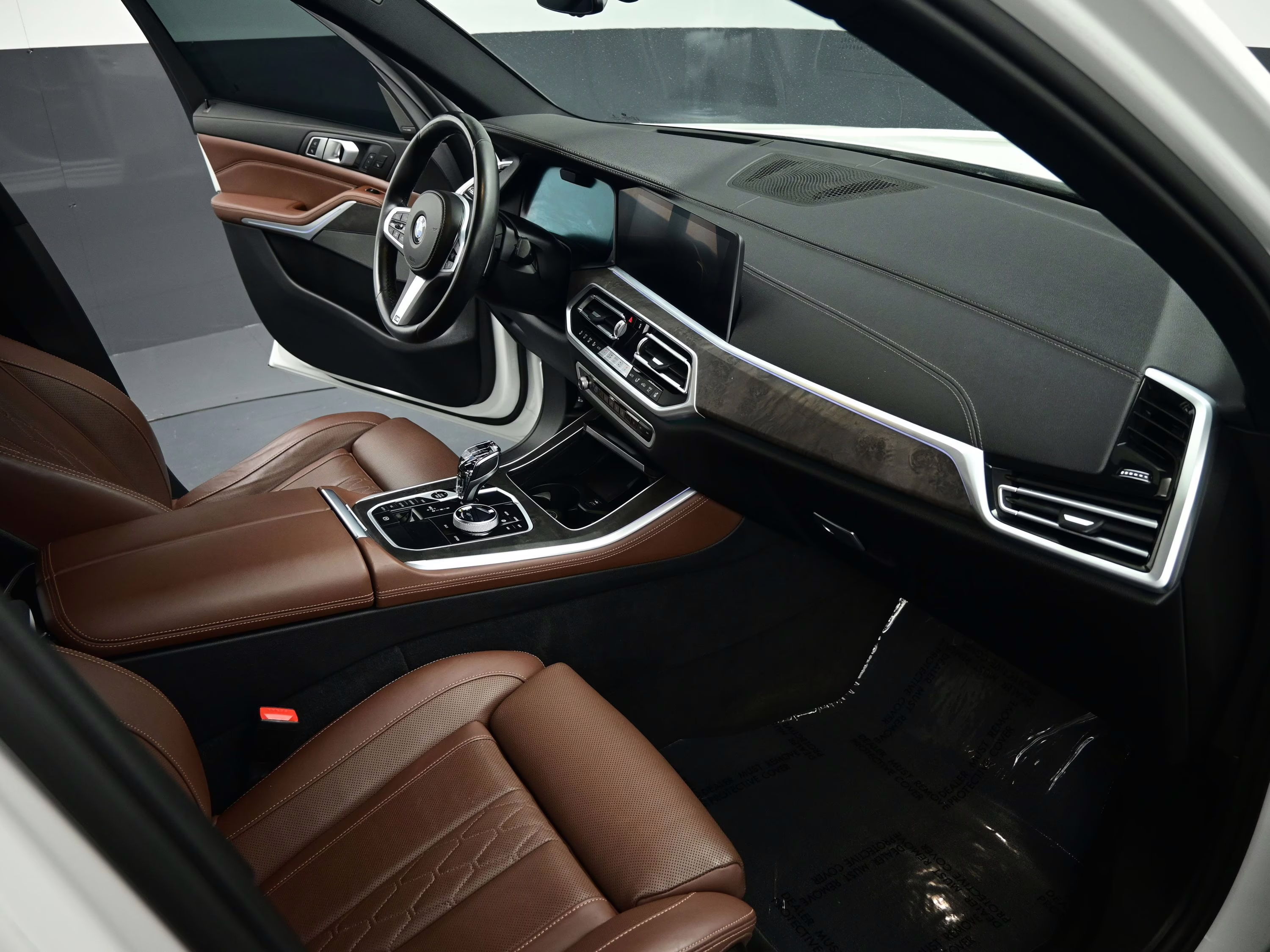 2023 Mineral White Metallic BMW X5 M50i AWD SUV