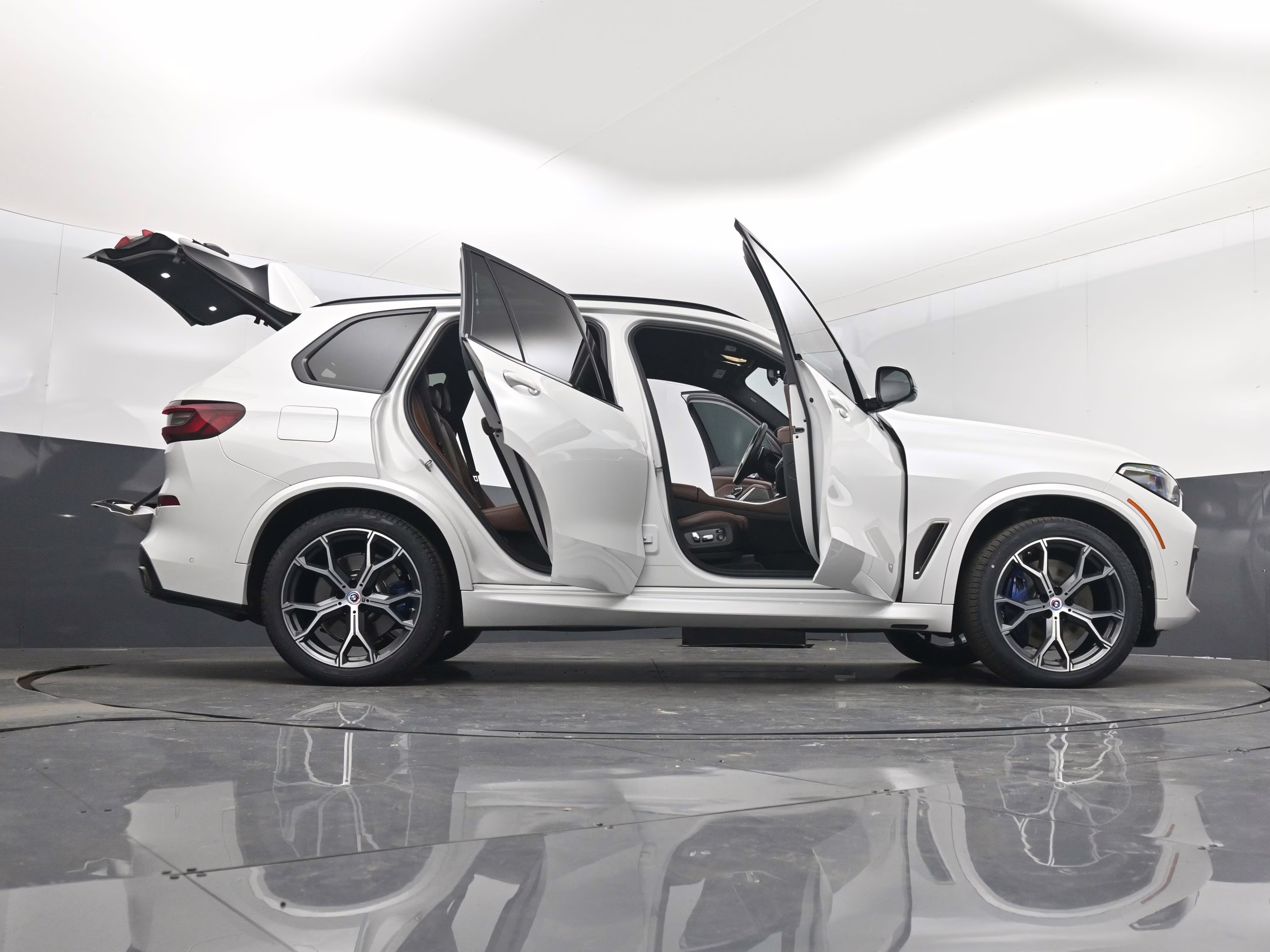 2023 Mineral White Metallic BMW X5 M50i AWD SUV
