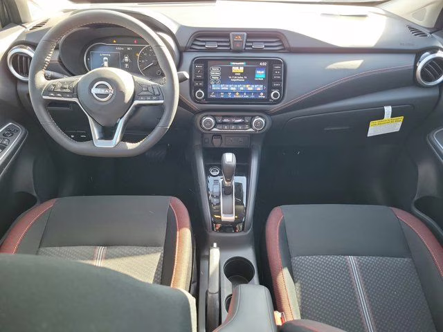 2025 Gun Metallic Nissan Versa 1.6 SR FWD Sedan
