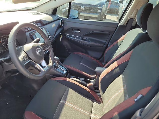 2025 Gun Metallic Nissan Versa 1.6 SR FWD Sedan