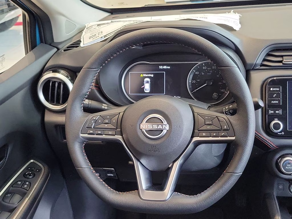 2025 Aspen White Tricoat Nissan Versa 1.6 SR FWD Sedan