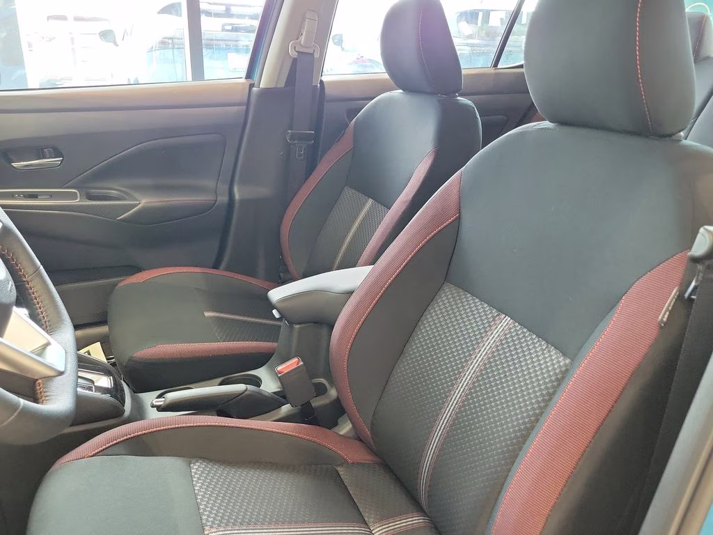 2025 Aspen White Tricoat Nissan Versa 1.6 SR FWD Sedan