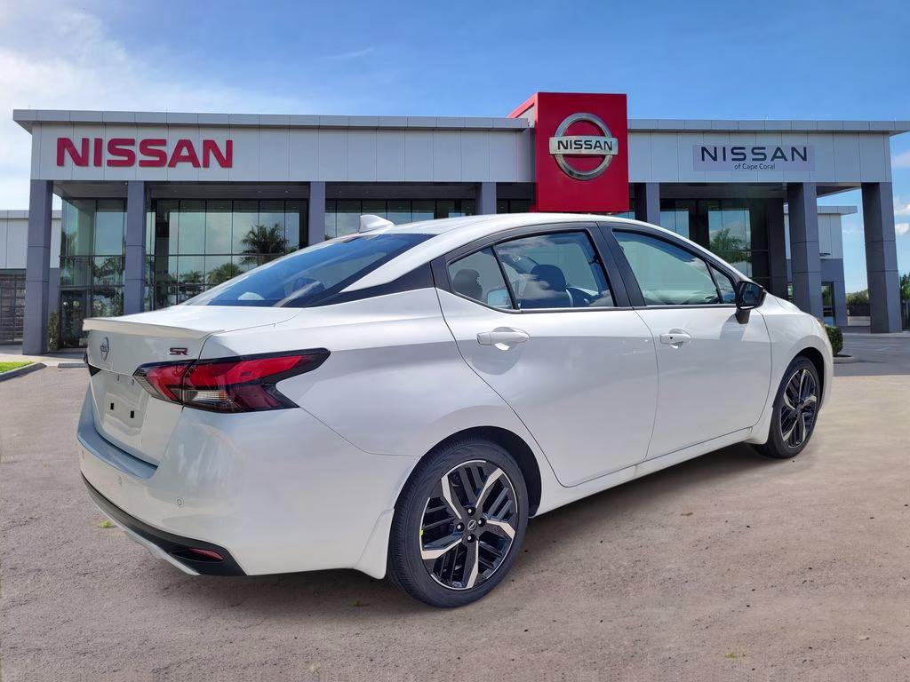 2025 Aspen White Tricoat Nissan Versa 1.6 SR FWD Sedan