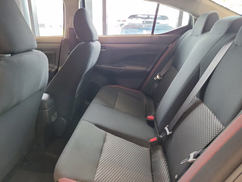 2025 Aspen White Tricoat Nissan Versa 1.6 SR FWD Sedan