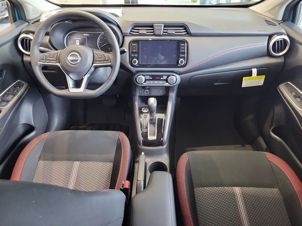 2025 Aspen White Tricoat Nissan Versa 1.6 SR FWD Sedan