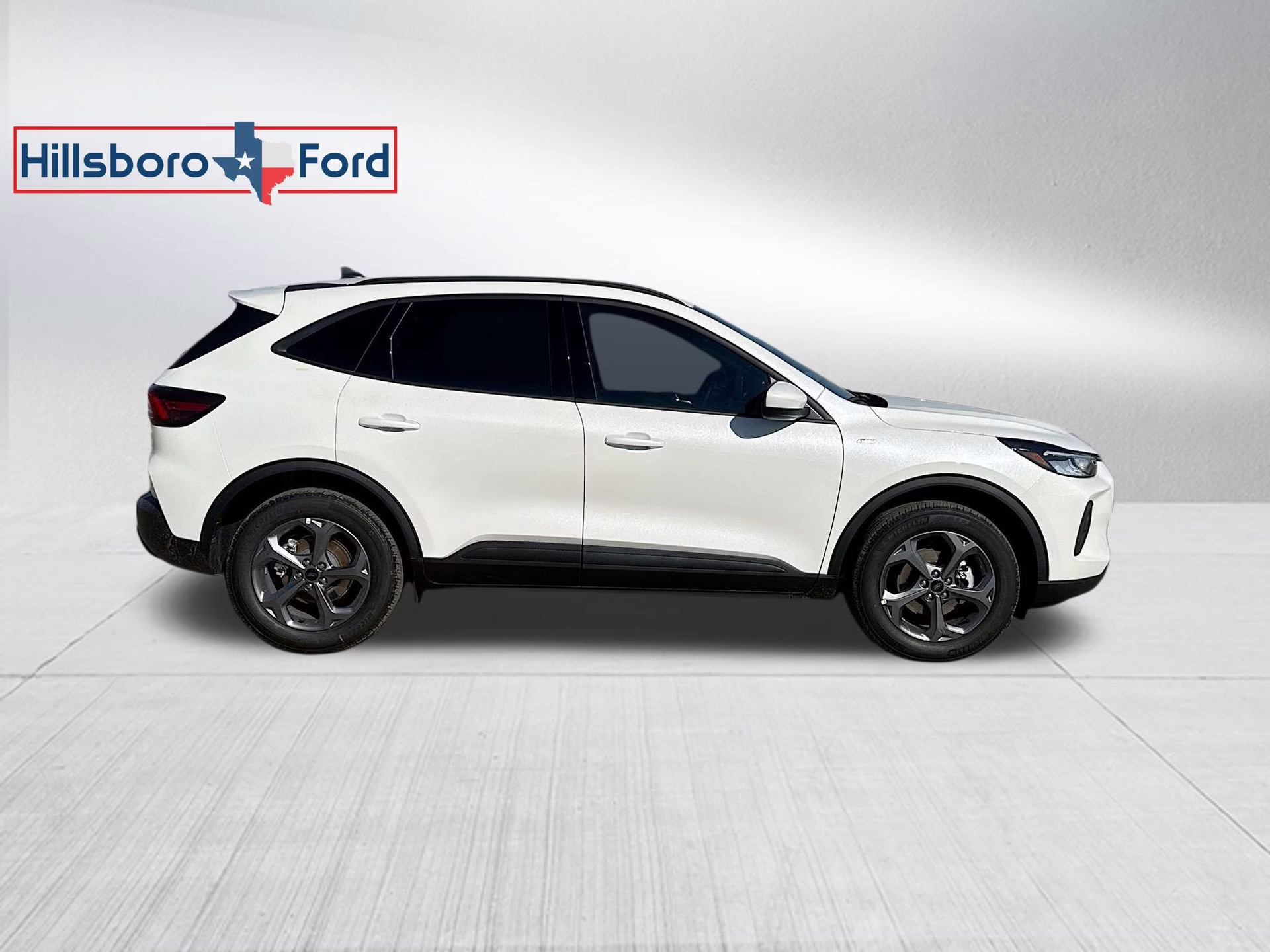 2026 Star White Metallic Tri-Coat Ford Escape Hybrid ST-Line Select AWD SUV