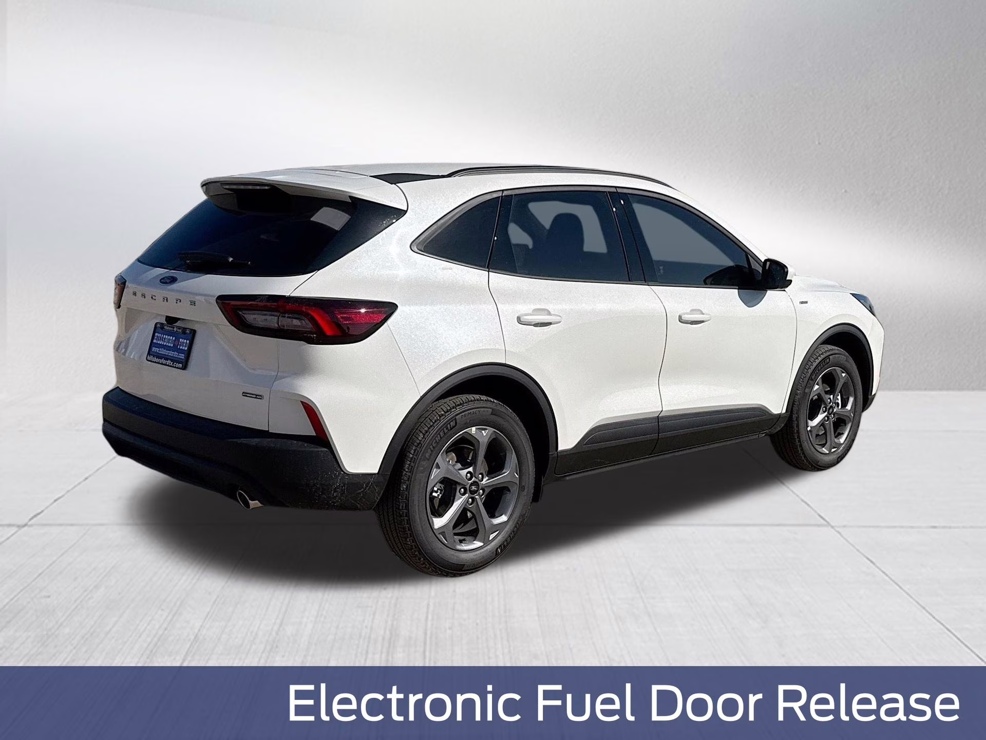 2026 Star White Metallic Tri-Coat Ford Escape Hybrid ST-Line Select AWD SUV