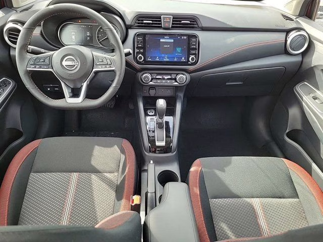 2025 Aspen White Tricoat Nissan Versa 1.6 SR FWD Sedan