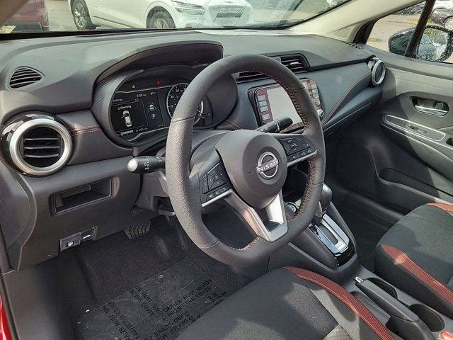 2025 Aspen White Tricoat Nissan Versa 1.6 SR FWD Sedan