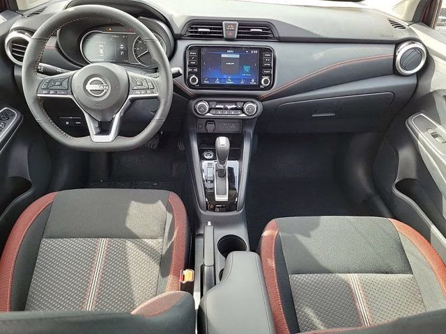 2025 Gray Sky Pearl Nissan Versa 1.6 SR FWD Sedan