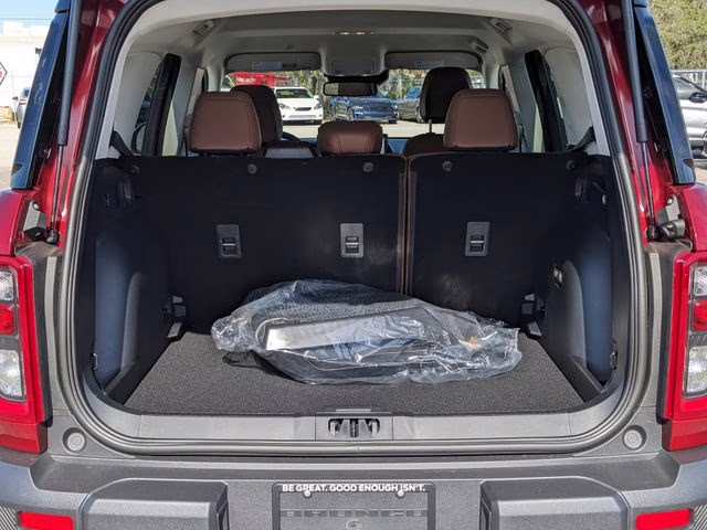 2025 Ruby Red Metallic Tinted Clearcoat Ford Bronco Sport Outer Banks 4X4 SUV