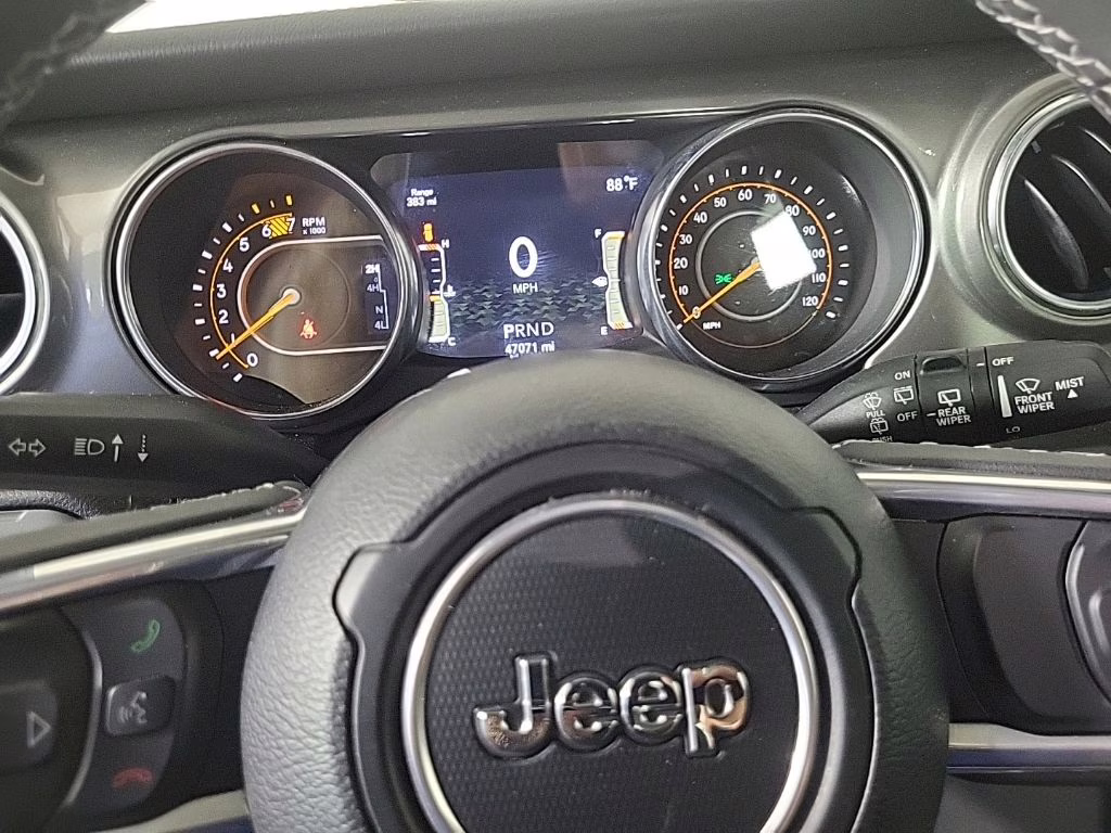2023 white Jeep Wrangler Sahara 4X4 SUV
