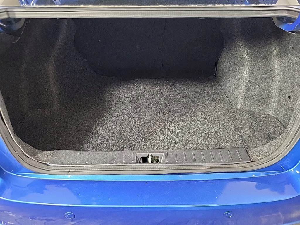 2024 Electric Blue Metallic Nissan Versa 1.6 SR FWD Sedan