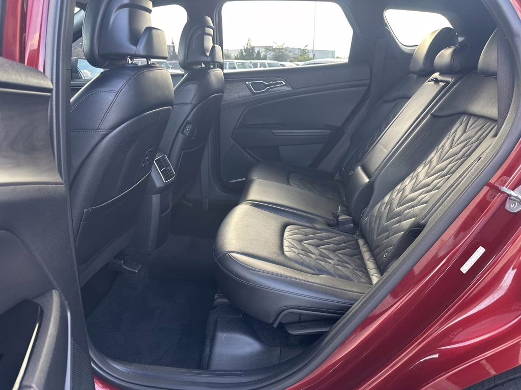 2024 Dawning Red Kia Sportage X-Line AWD SUV