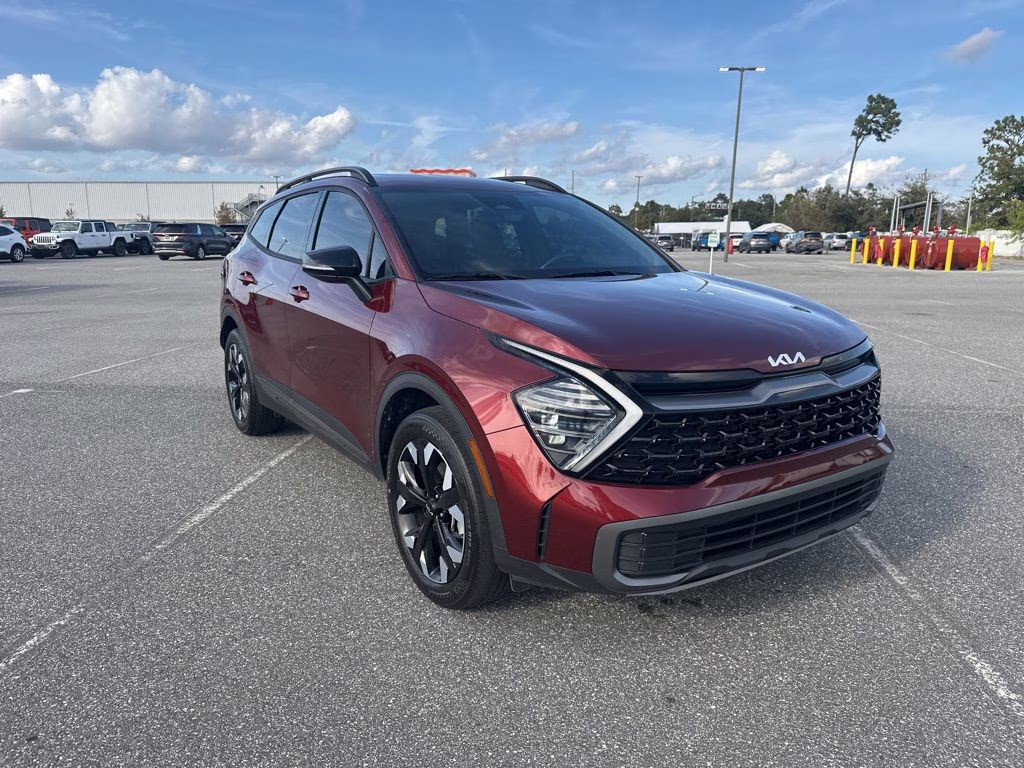 2024 Dawning Red Kia Sportage X-Line AWD SUV