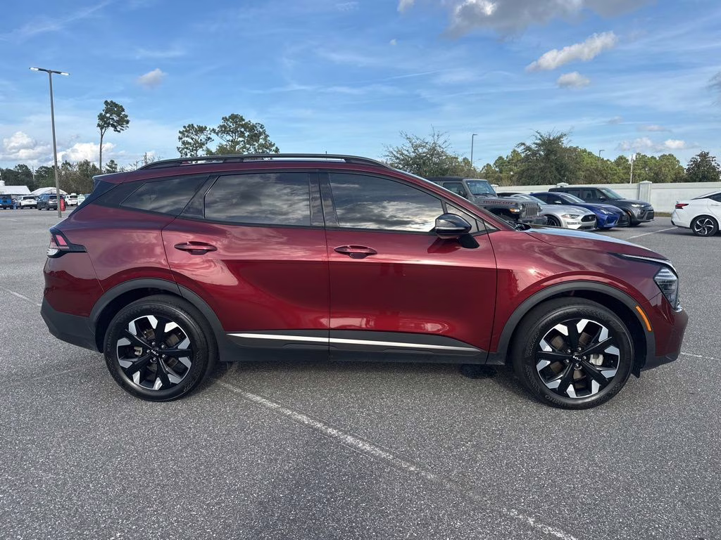 2024 Dawning Red Kia Sportage X-Line AWD SUV