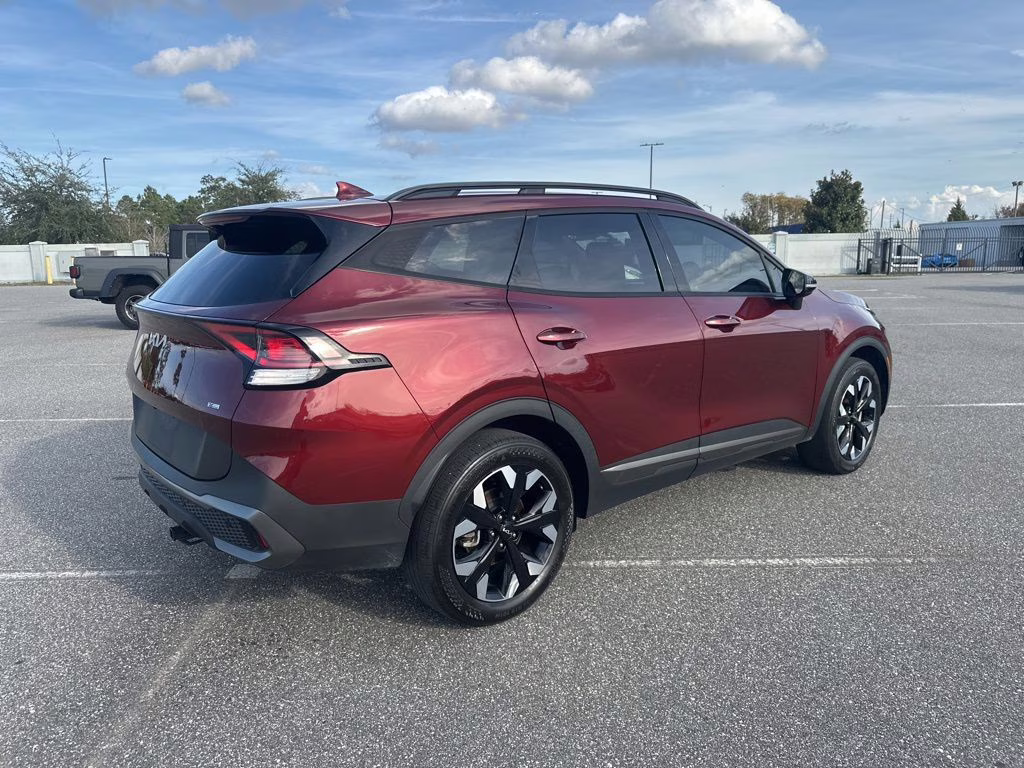 2024 Dawning Red Kia Sportage X-Line AWD SUV