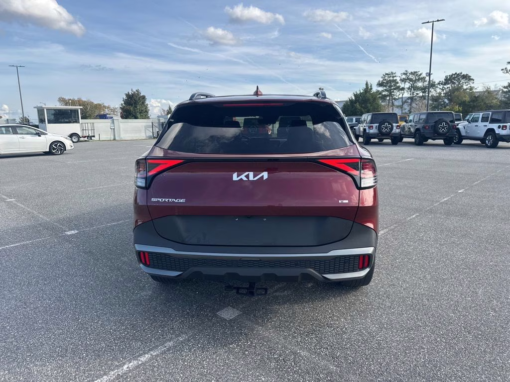 2024 Dawning Red Kia Sportage X-Line AWD SUV