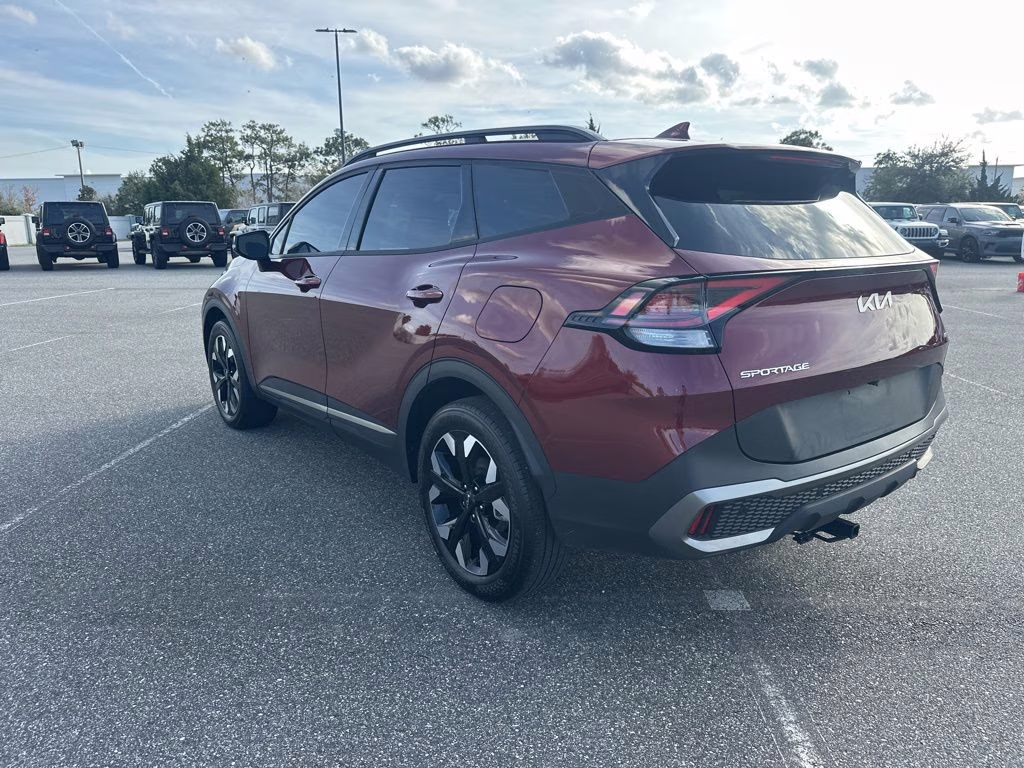 2024 Dawning Red Kia Sportage X-Line AWD SUV