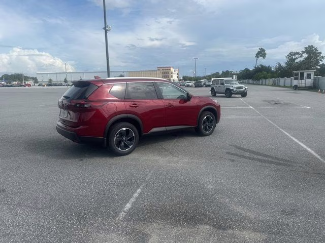 2025 Scarlet Ember Tintcoat Nissan Rogue SV AWD SUV
