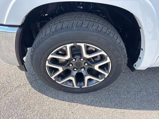 2026 Ivory White Ram 1500 Laramie 4X4 Truck
