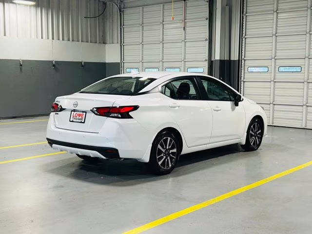 2025 Aspen White Tricoat Nissan Versa 1.6 SV FWD Sedan