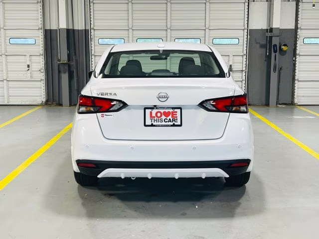 2025 Aspen White Tricoat Nissan Versa 1.6 SV FWD Sedan