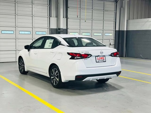 2025 Aspen White Tricoat Nissan Versa 1.6 SV FWD Sedan