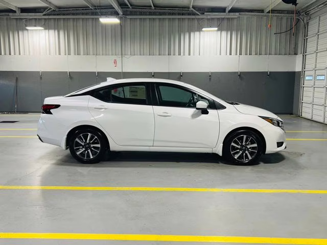2025 Aspen White Tricoat Nissan Versa 1.6 SV FWD Sedan