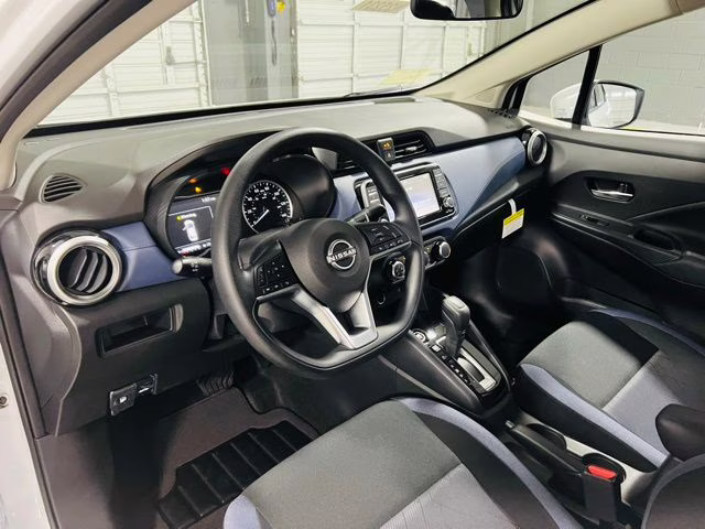 2025 Aspen White Tricoat Nissan Versa 1.6 SV FWD Sedan