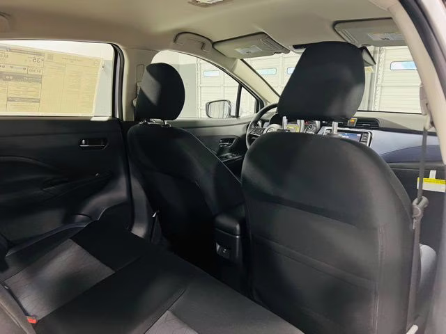 2025 Aspen White Tricoat Nissan Versa 1.6 SV FWD Sedan