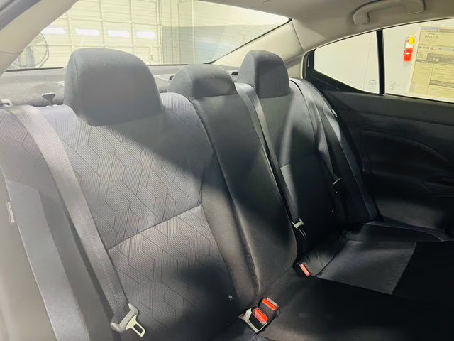 2025 Aspen White Tricoat Nissan Versa 1.6 SV FWD Sedan