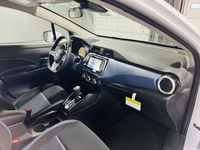 2025 Aspen White Tricoat Nissan Versa 1.6 SV FWD Sedan