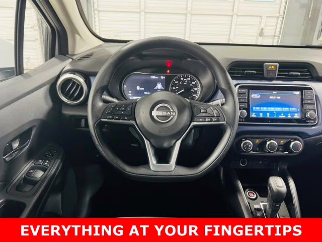 2025 Aspen White Tricoat Nissan Versa 1.6 SV FWD Sedan