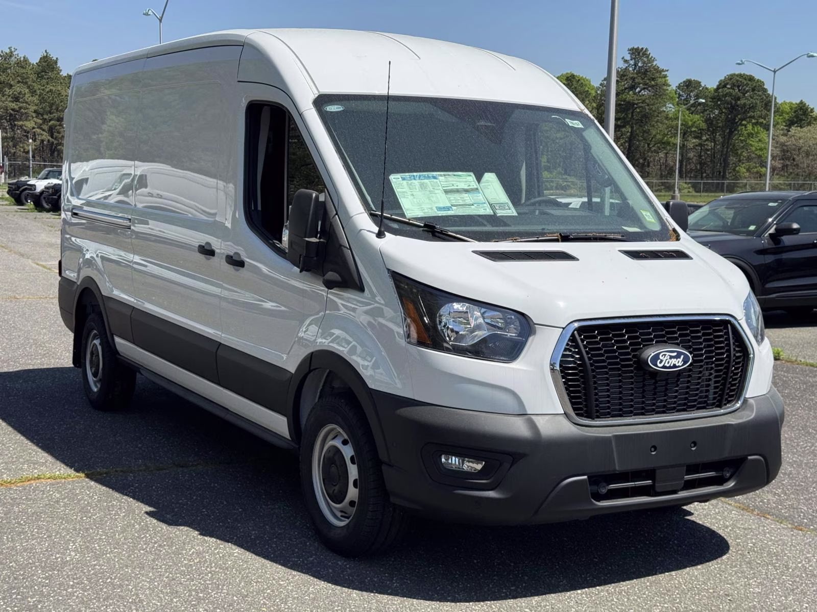 2026 Oxford White Ford Transit Cargo Van T-250 148 Med Rf 9150 GVWR RWD RWD Van