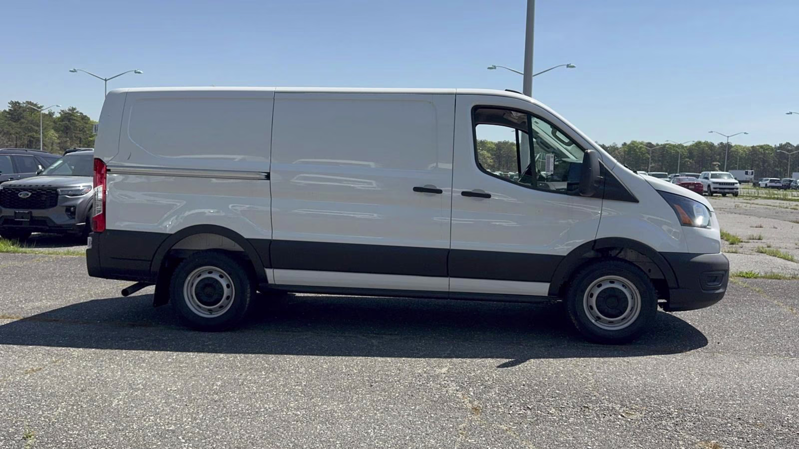 2026 Oxford White Ford Transit Cargo Van T-250 148 Med Rf 9150 GVWR RWD RWD Van