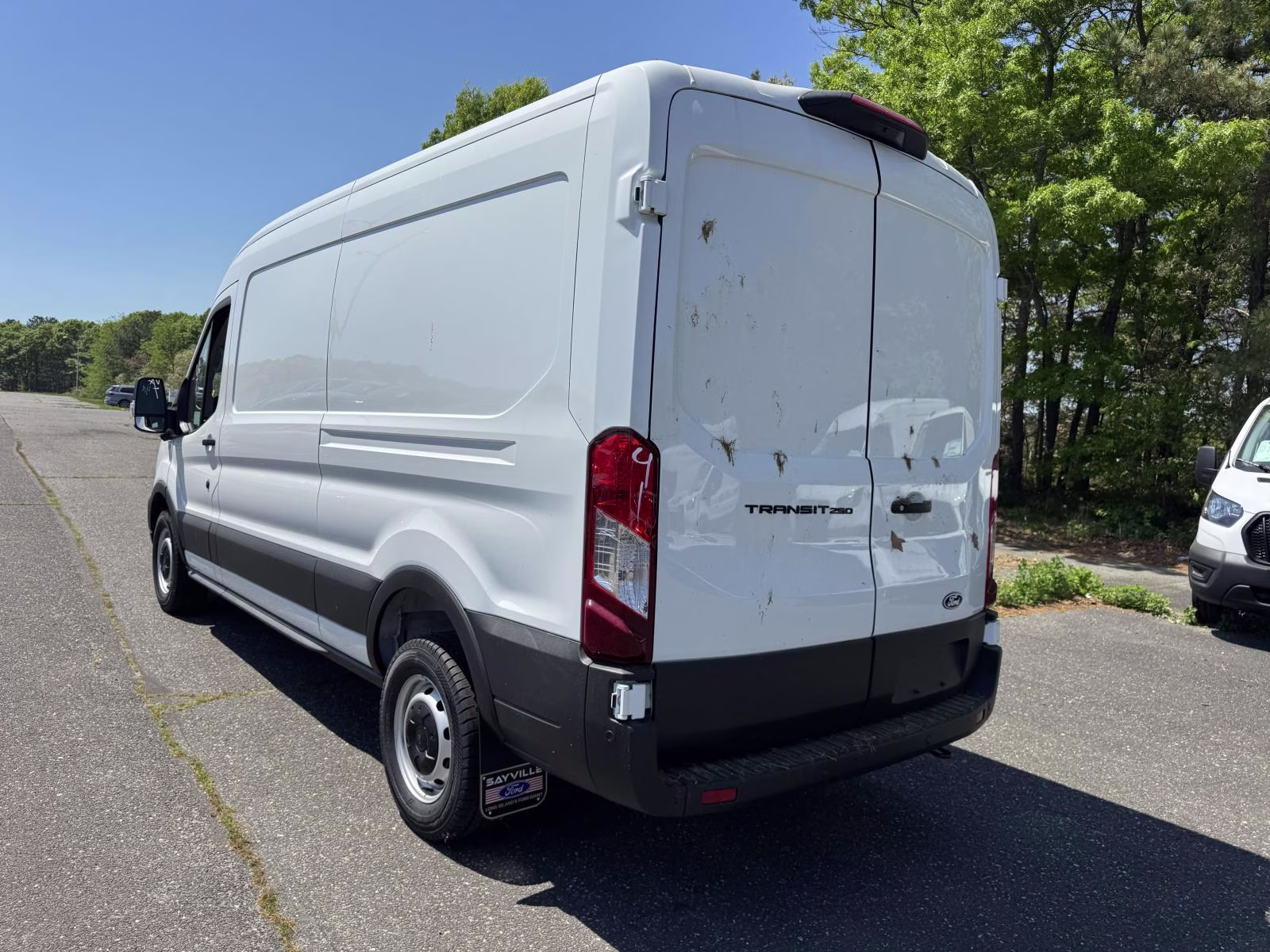 2026 Oxford White Ford Transit Cargo Van T-250 148 Med Rf 9150 GVWR RWD RWD Van