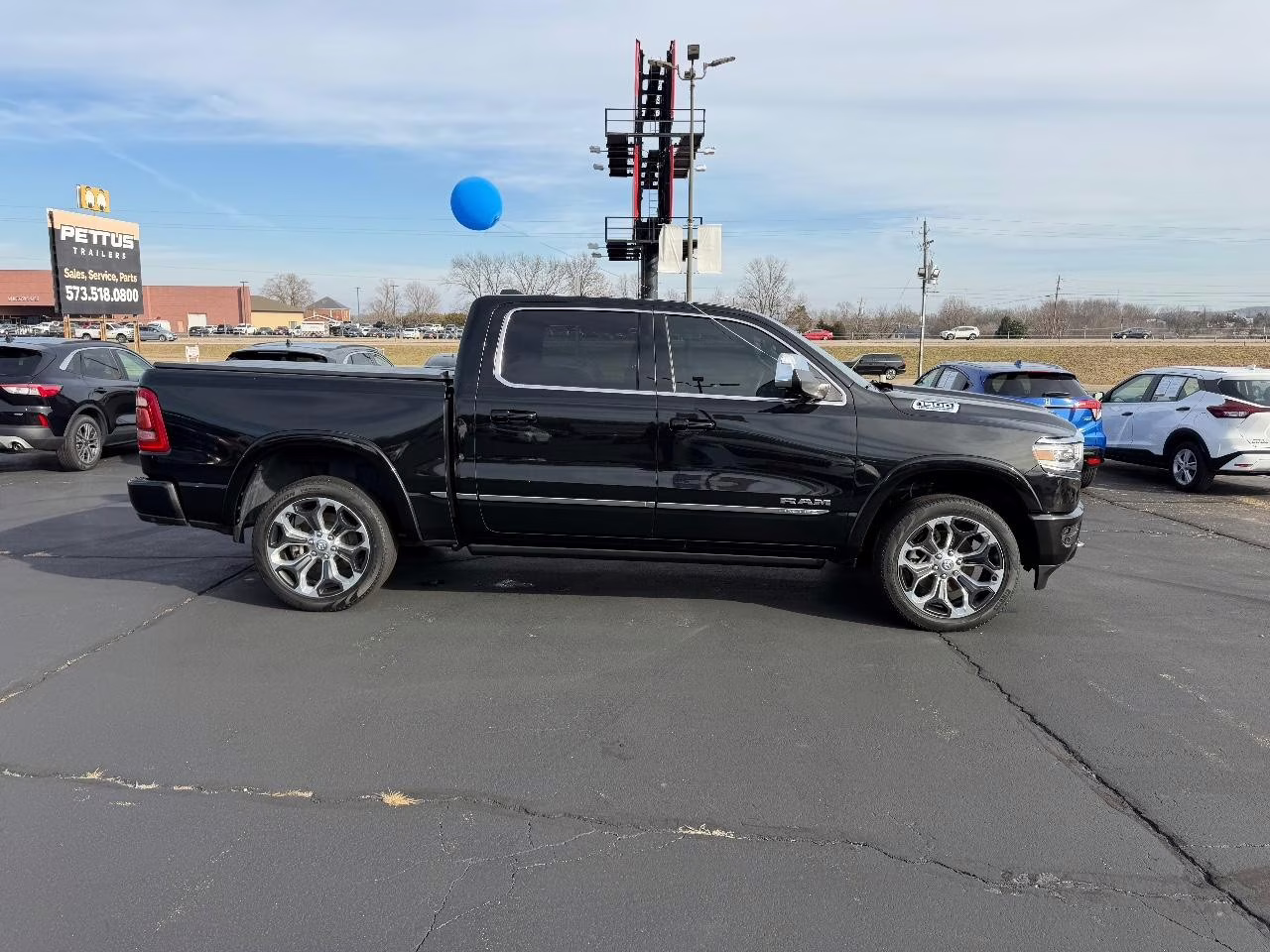 2023 Diamond Black Crystal Pearlcoat Ram 1500 Limited 4X4 Truck