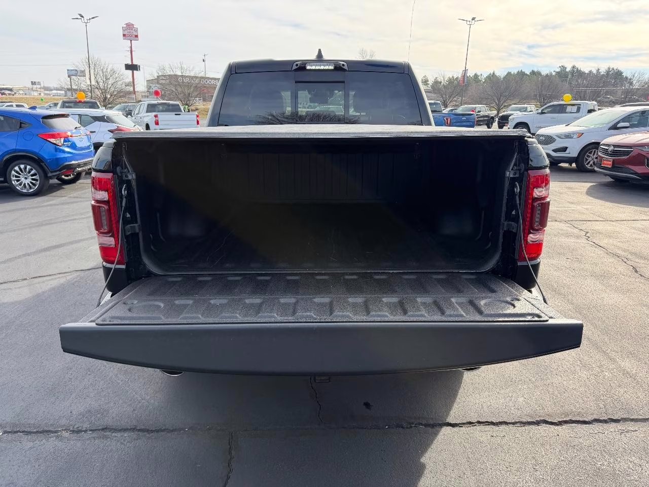 2023 Diamond Black Crystal Pearlcoat Ram 1500 Limited 4X4 Truck