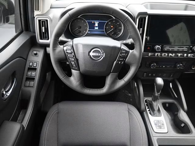 2026 Glacier White Nissan Frontier SV 4X4 Truck