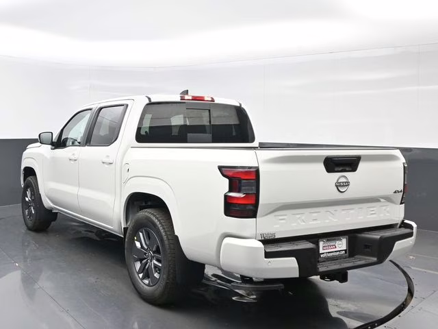 2026 Glacier White Nissan Frontier SV 4X4 Truck