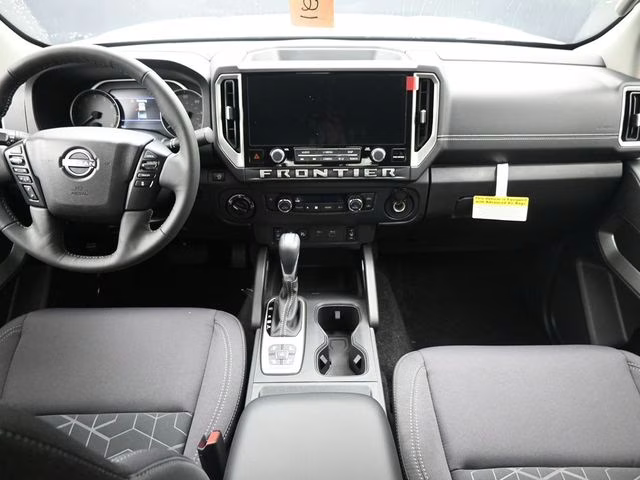2026 Glacier White Nissan Frontier SV 4X4 Truck