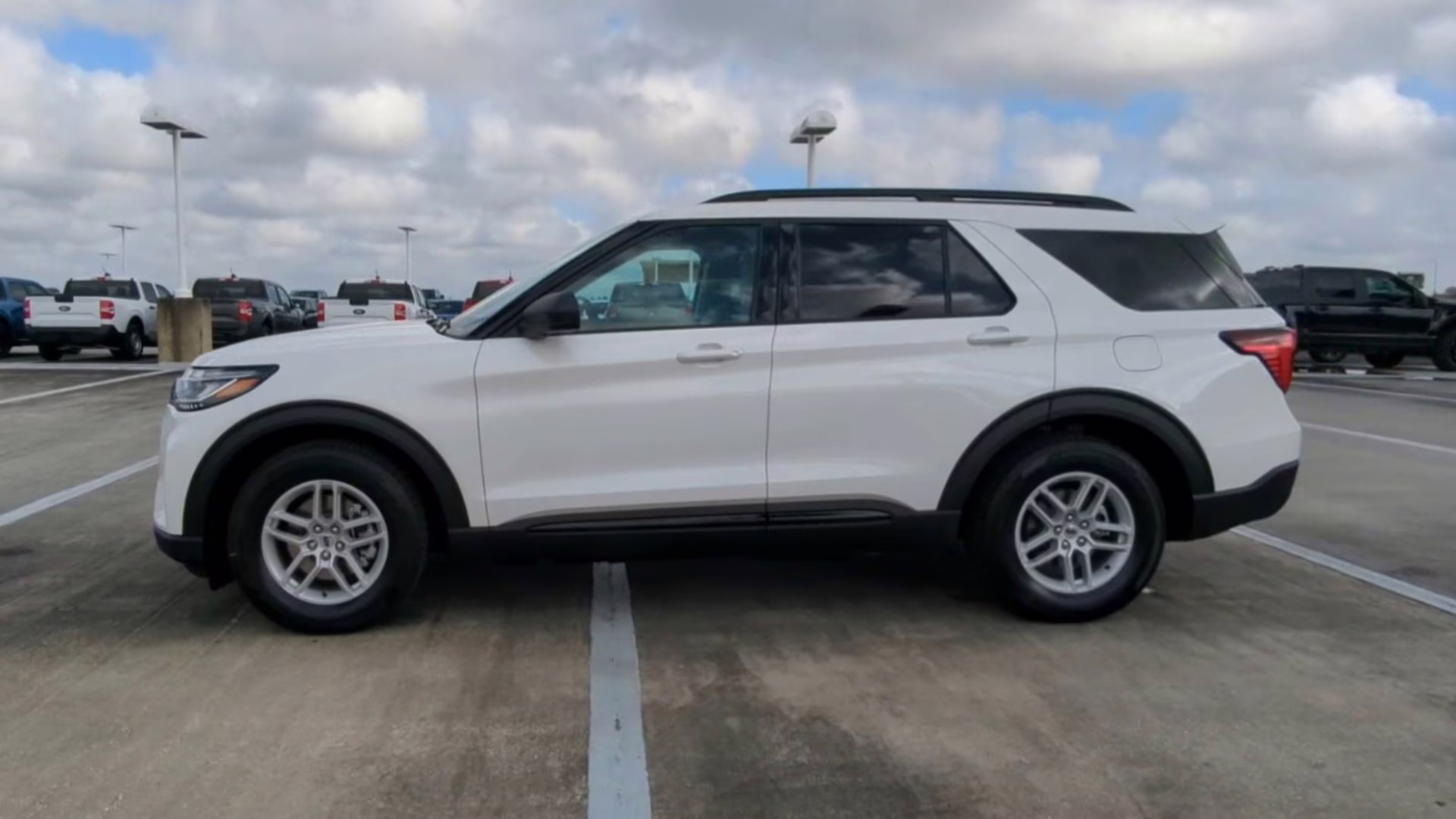 2026 Star White Metallic Tri-Coat Ford Explorer Active RWD SUV