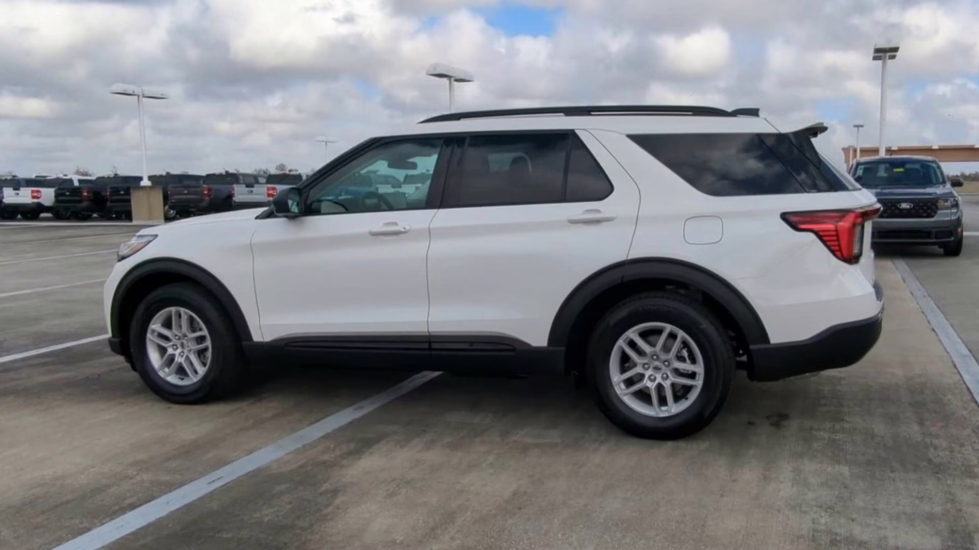 2026 Star White Metallic Tri-Coat Ford Explorer Active RWD SUV