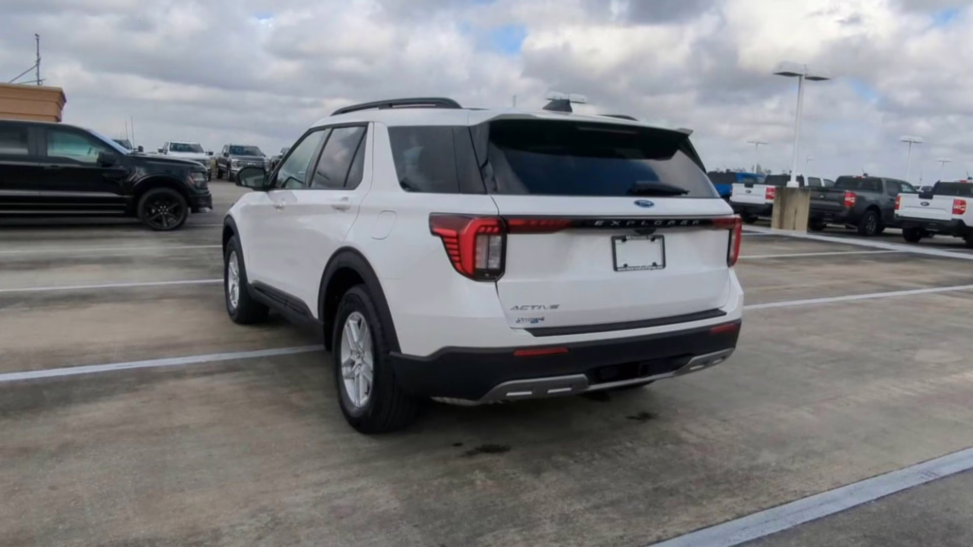 2026 Star White Metallic Tri-Coat Ford Explorer Active RWD SUV