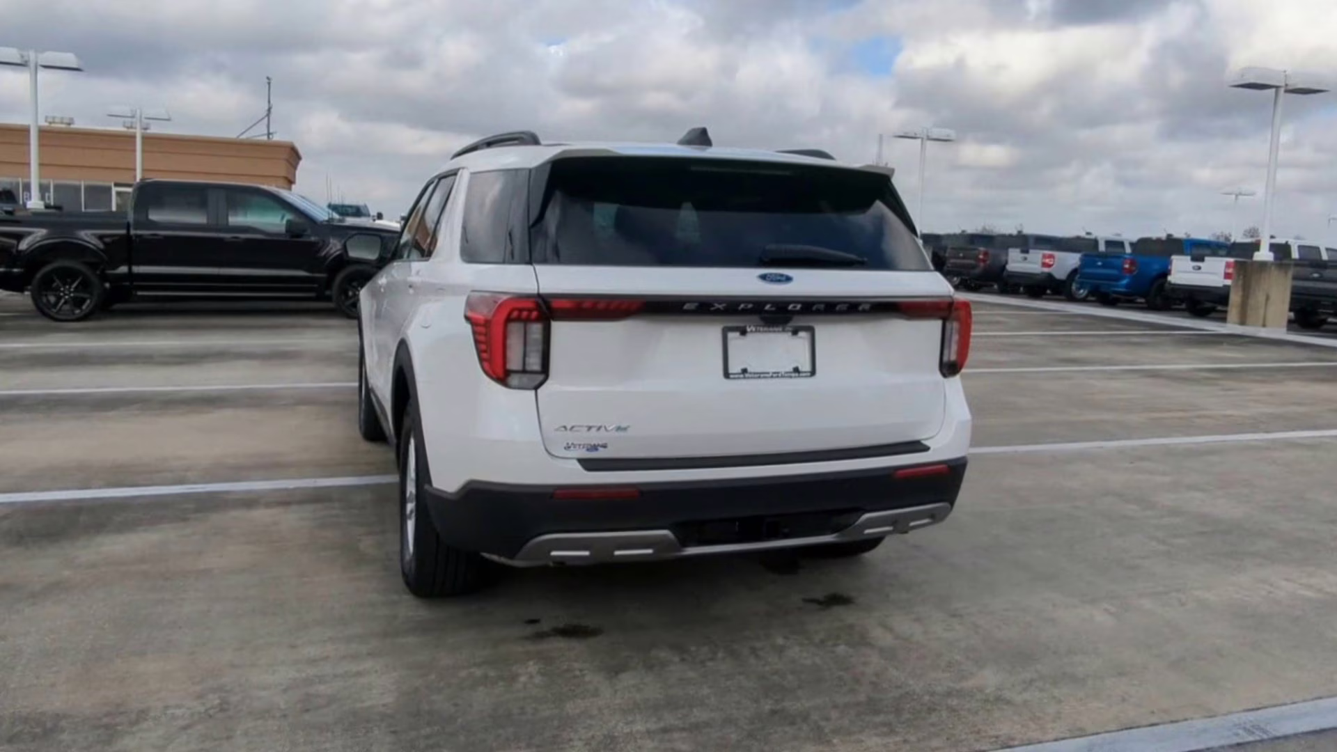 2026 Star White Metallic Tri-Coat Ford Explorer Active RWD SUV